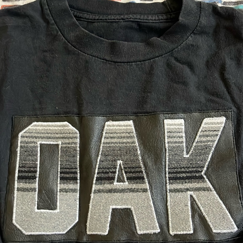 Oakland Raider’s Black Tee w/ Lettering on the Front